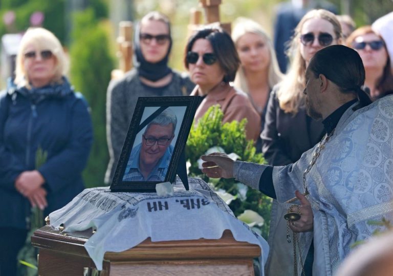 Russia’s Prigozhin Buried Privately In St Petersburg An Orthodox priest conducts a service during the funeral for Valery Chekalov, logistics chief of the Wagner private mercenary group, at the Severnoye cemetery in Saint Petersburg, Russia.