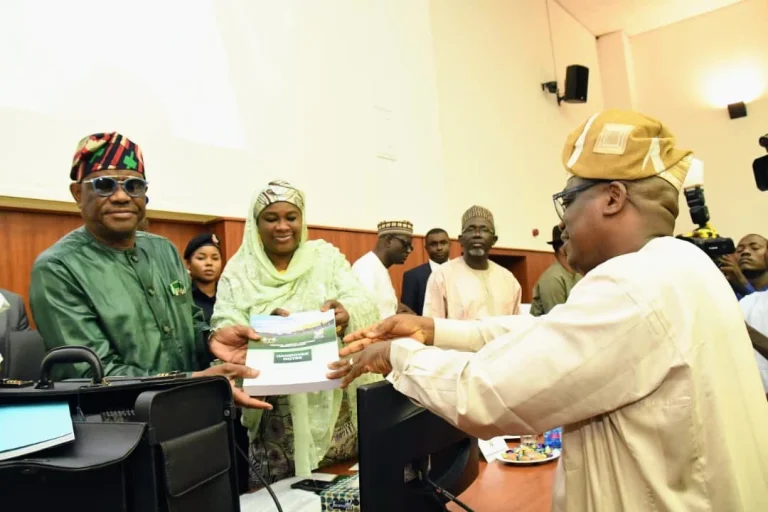 Wike Seeks Workers Support To Make Abuja City Great From L-R: Minister of the Federal Capital Territory (FCT), Abuja, Mr Nyesom; Minister of State for FCT, Dr Mariya Mahmoud receiving handing over notes from the Permanent Secretary, FCT Administration, Mr Adesola Olusade in Abuja on Tuesday