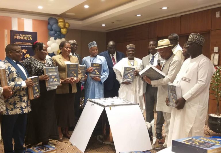 With Existing Tax Laws, No Need For Increase In Taxes In Nigeria – Don Prof. Ezekiel Williams, left, author of the book, The Tax Pendula, with other dignitaries at the book launch in Abuja.