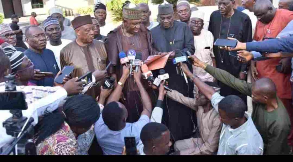 Senator Ameh Ebute, reading the communiqué, Sen. Gemade on his right, amongs others.