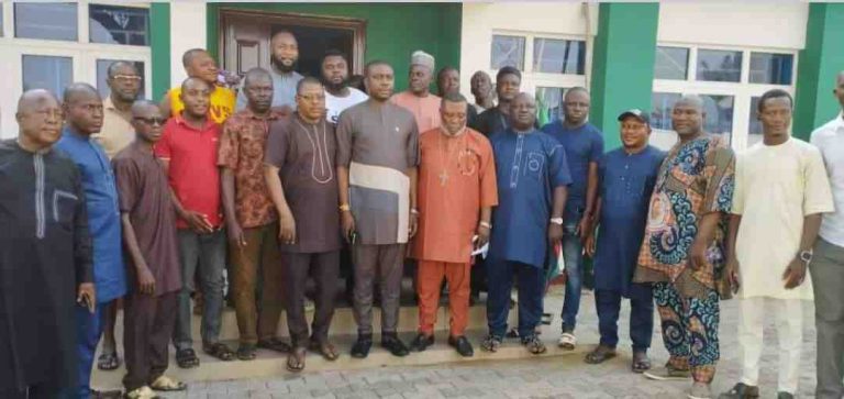 Benue: Agada In Triumphant Return To APC Secretariat, As Omakolo Purportedly Appeals Judgement Agada, 7th from left in the front row, in a group photograph with members of the APC State Working Committee shortly after he held a press conference at the APC state secretariat.