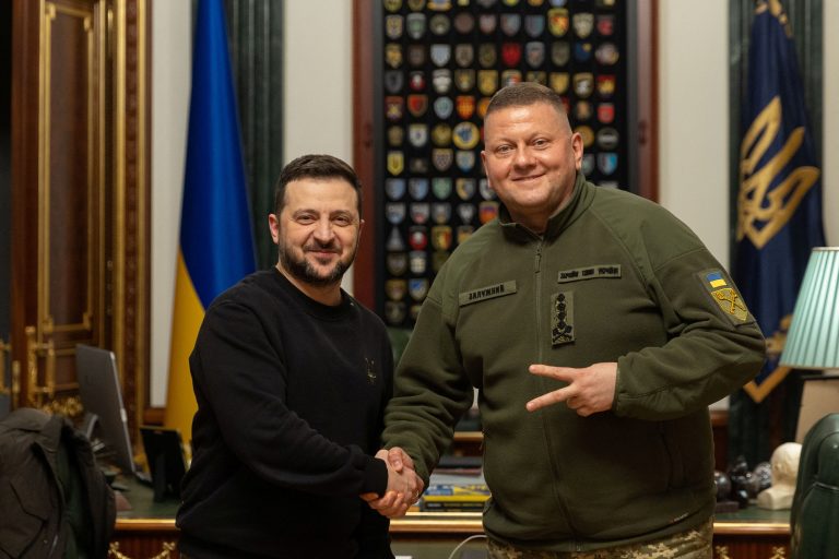 Ukraine's President Volodymyr Zelenskiy and Commander in Chief of the Ukrainian Armed Forces Valerii Zaluzhnyi shake hand and pose for a picture during their meeting, amid Russia's attack on Ukraine, in Kyiv, Ukraine February 8, 2024. Ukrainian Presidential Press Service/Handout via REUTERS