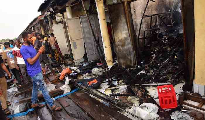 Police Clarify Mob Action That Set Ablaze Vehicles, Shops In Wuse Market A block of shops razed by fired at Wuse Market after killing of Yahaya by a Correctional Service officer on Tuesday.
