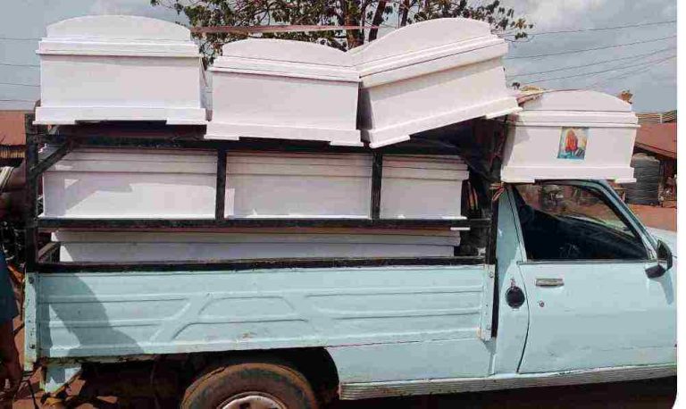 Caskets being conveyed to Wandor Community for the mass burial of the 16 victims before Governor Alia postponed it.
