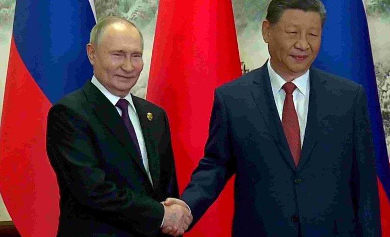Russian President Vladimir Putin and Chinese President Xi Jinping meet in Beijing, China May 16, 2024, in this still image taken from live broadcast video