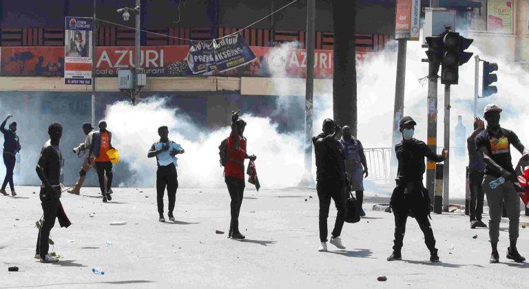 Demonstrators gesture as police use tear gas to disperse protesters during a demonstration against Kenya's proposed finance bill 2024/2025 in Nairobi, Kenya, June 25. REUTERS/Monicah Mwangi
