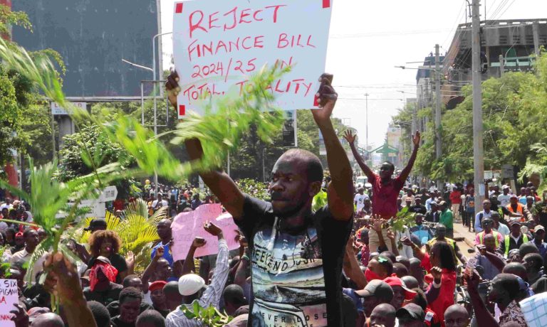 One Person Killed, Over 200 Injured In Kenya’s Anti-Tax Protests Protesters react during a demonstration against Kenya's proposed finance bill