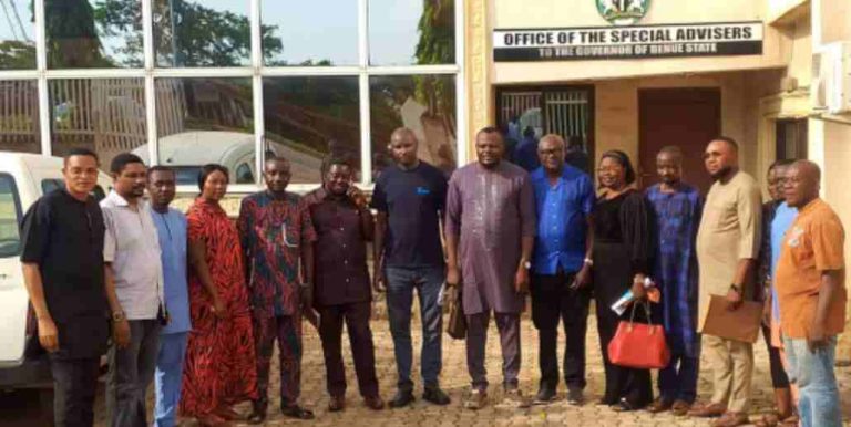 Group photograph of the representatives of the groups with Hon. Mkeenem Moses, middle