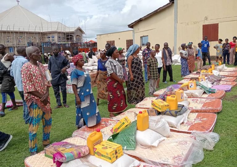 The alleged diverted palliatives being distributed to the beneficiaries in Kwande LG of Benue State, Friday.