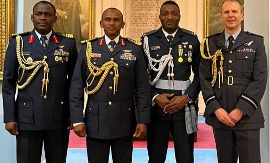 NDA Celebrates Cadet’s Exceptional Achievement At Royal Air Force College In UK From second right - cadet Nicholas John, next to him Deputy Commandant NDA AVM Abubakar Abdulkadir during cadets John’s graduation at Royal Air Force College Cranwell United Kingdom.