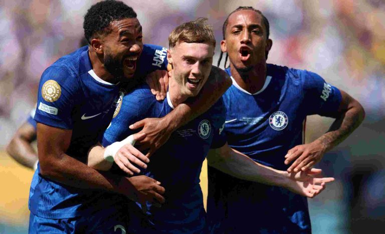Chelsea's Cole Palmer celebrates after scoring a goal with Reece James and Joao Pedro. Reuters