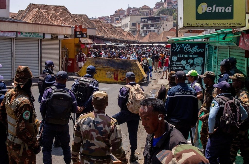 Malagasy police prepare to disperse protesters during a demonstration to denounce frequent power outages and water shortages in Antananarivo