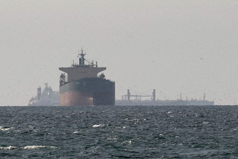 Cargo ships in the Gulf, near the Strait of Hormuz, as seen from northern Ras al-Khaimah, near the border with Oman’s Musandam governance, amid the U.S.-Israeli conflict with Iran.