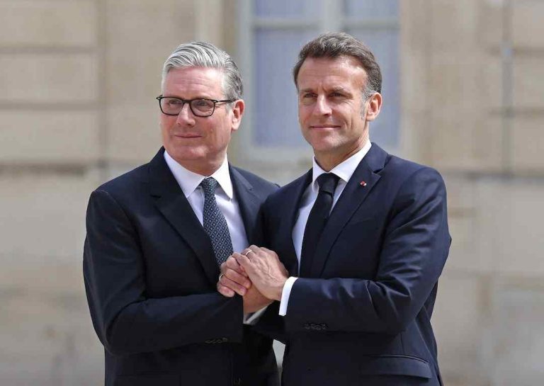 French President Emmanuel Macron greets British Prime Minister Keir Starmer