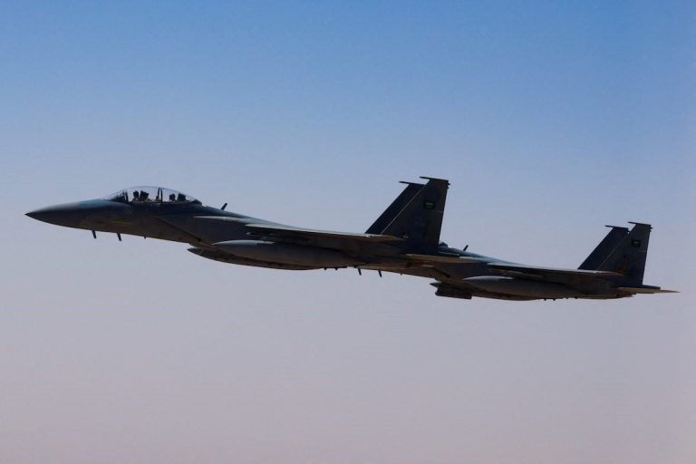 A Saudi fighter jet accompanies Air Force One