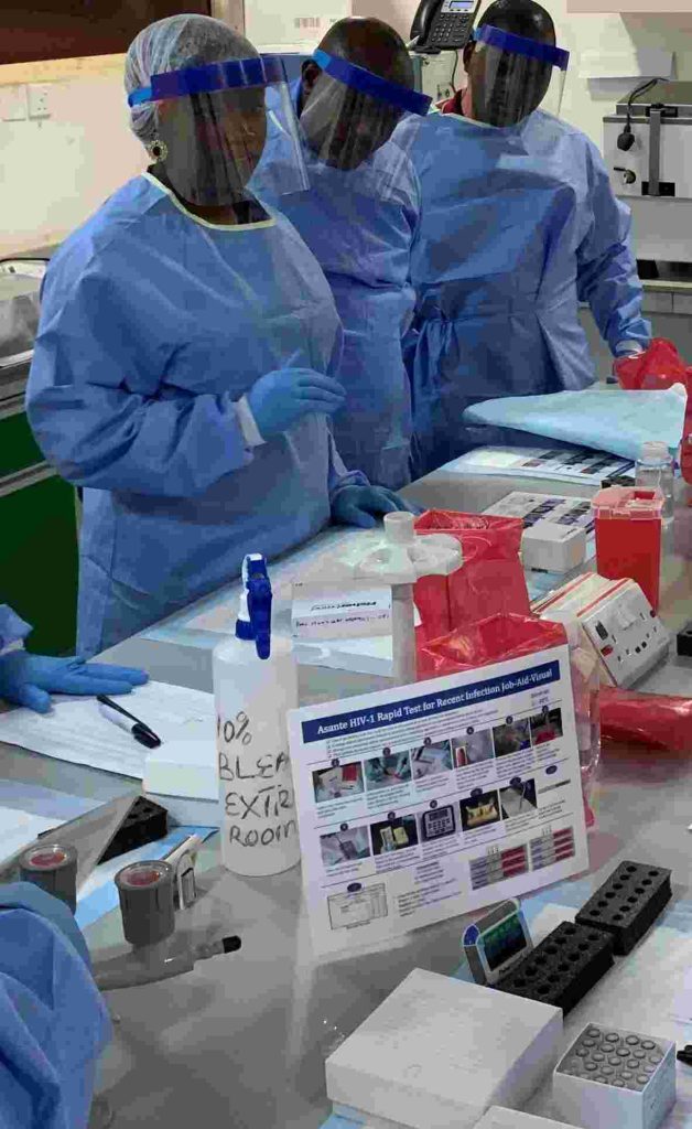 Pankemwa providing onsite technical guidance and mentorship to laboratory personnel @ National Reference Lab during diagnostic activities.