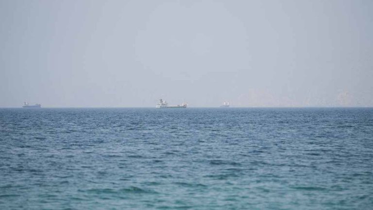 Vessels near the Strait of Hormuz, as seen from Musandam, Oman, August 6, 2026. REUTERS/Stringer